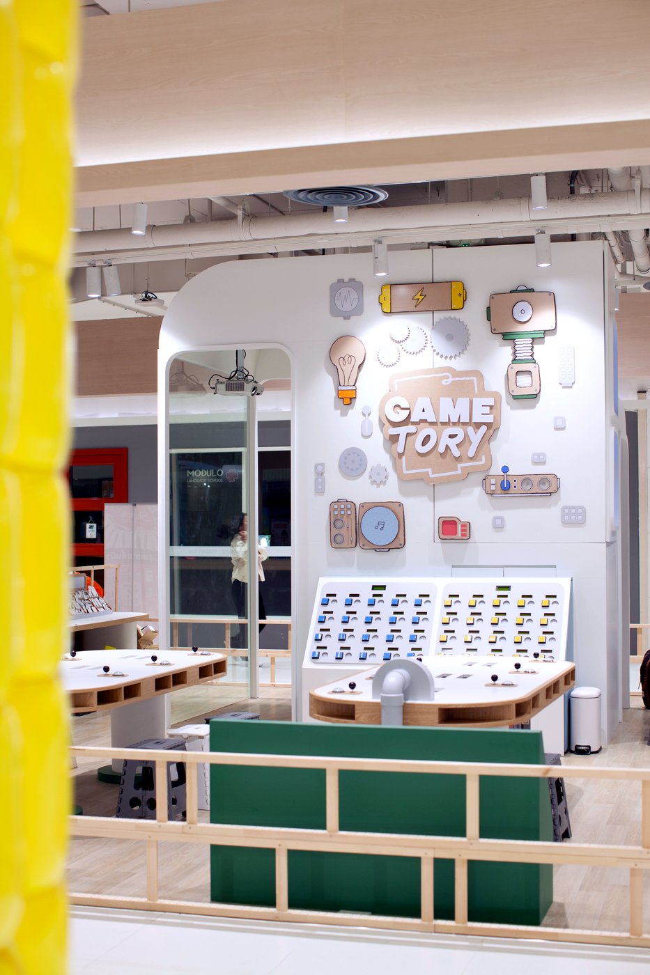 Inside Gametory Arcade at CentralWorld — the brand wall and design stations